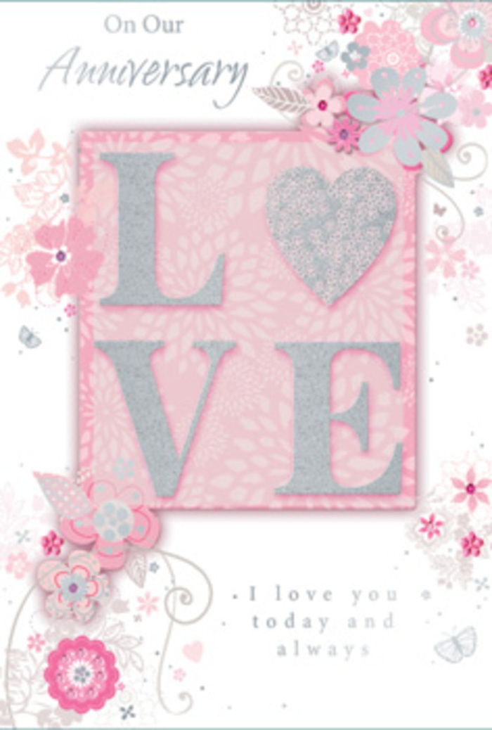 An open anniversary card rests as if waiting beside a fresh bouquet on a Longford kitchen table, its design radiating a gentle, enduring romance. Dominating the centre of the card is the word LOVE, each letter raised and coated in a fine, frosted glitter that shimmers subtly, never garish, like dew on pale petals at first light. The surface looks irresistibly touchable, encouraging you to run a fingertip along the sparkled contours just as you might trace the curve of a rose. Enveloping this central word is a halo of graceful, hand-drawn flowers, leaves, and swirling stems, each line crisp yet light, giving the impression of delicate ink sketches inspired by cottage gardens around Longford. The colour palette is soft and harmonious: blush pinks, pearlescent whites, muted lilacs, and softly shaded greys that together create a serene, almost dreamlike atmosphere. The background blush tone feels like a wash of watercolour, gently diffused, allowing the florals and lettering to float above it. Look closely and you can imagine tiny filigree curls, almost-hidden butterflies, and slender leaves that mimic the gentle movement of real foliage in a breeze by the River Crane. The typography inside the design is elegant but understated, with flowing script phrases such as I love you today and always, placed thoughtfully so as not to disturb the balance of the artwork. This card feels like a paper version of a hand-tied anniversary bouquet-a quiet, intimate gesture crafted with the same level of care a local florist brings to arranging fresh stems for delivery across Longford.